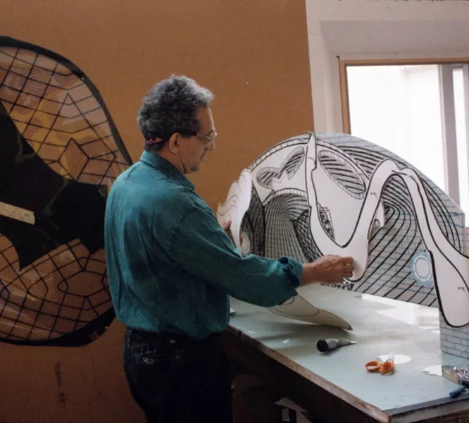 Frank Stella in the artist studio working on 'Moby Dick Domes’ series