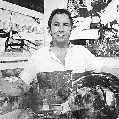 Black and white portrait photo of Robert Rauschenberg