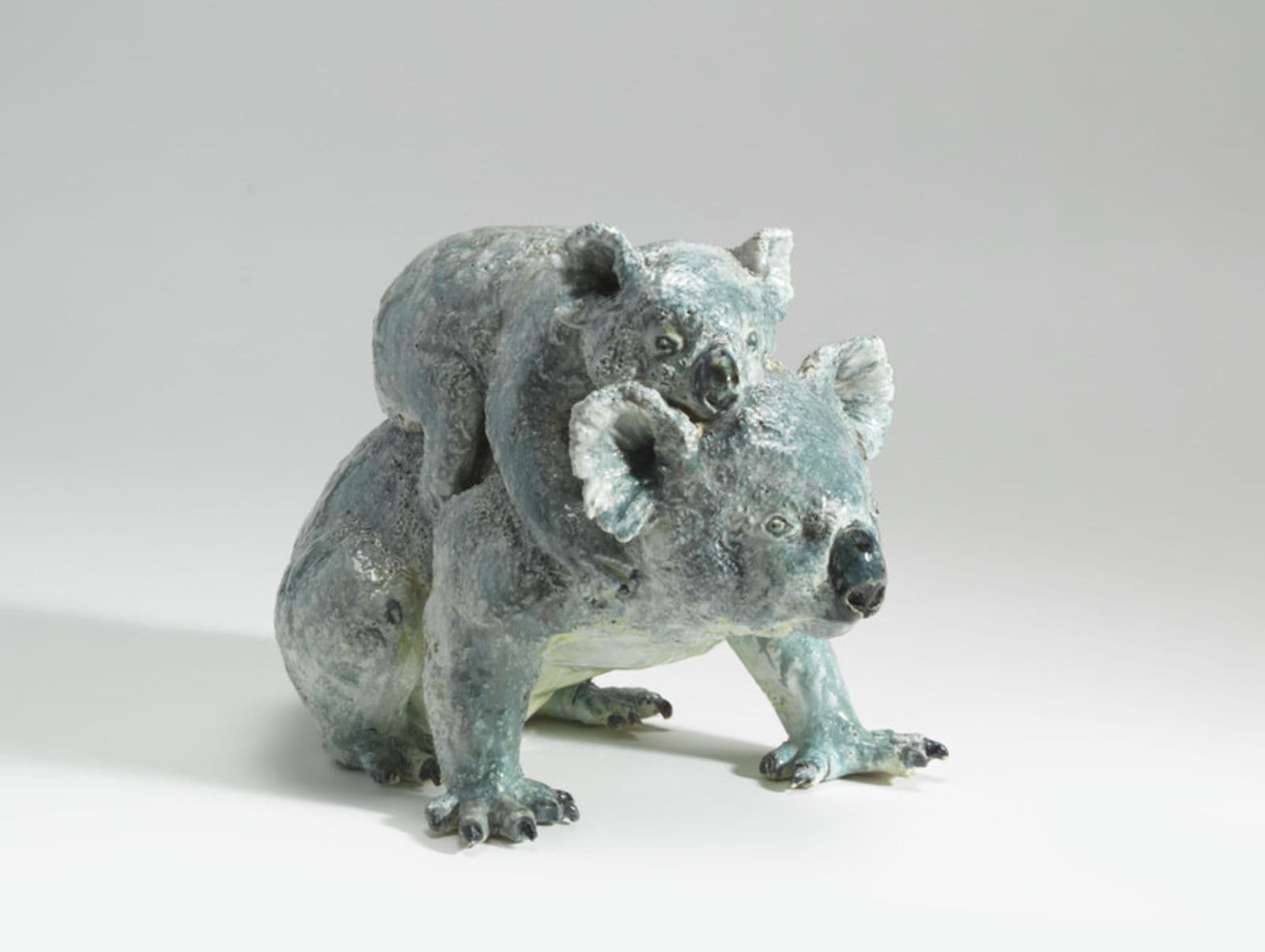 Ceramic sculpture of koala with joey on its back