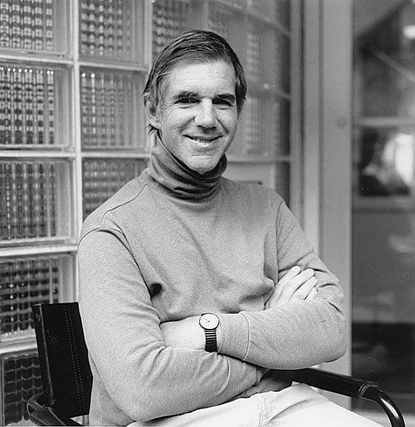 Black and white portrait photo of Sam Posey