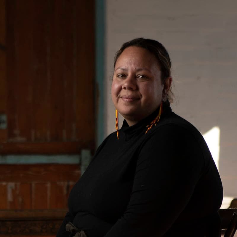 Portrait of a female sitting in a chair
