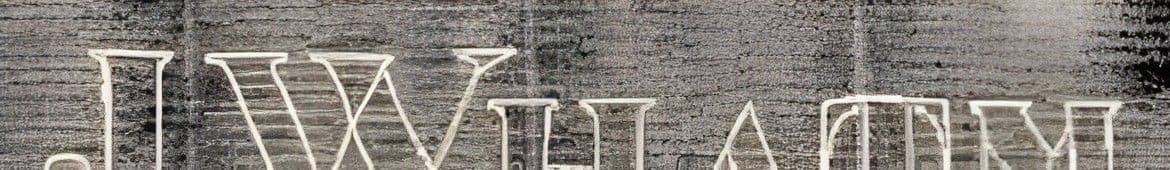 Top section of a watermark reading 'J Whatman'