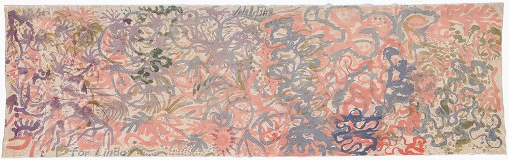 A long rectangular textile with patterns in pale blue and red.