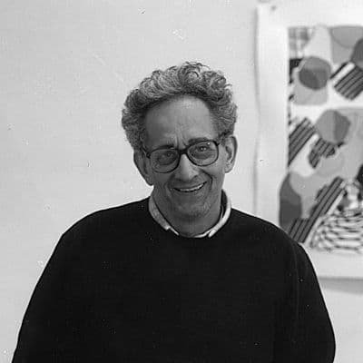 Black and white photograph of Frank Stella