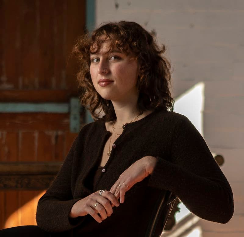 Portrait of a female sitting in a chair