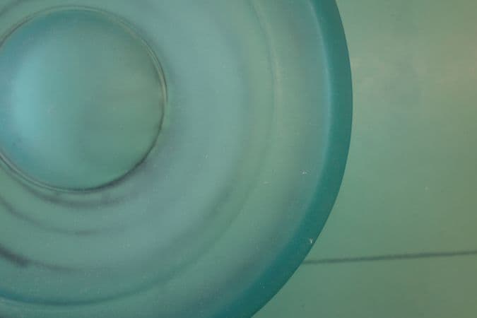 Colour photograph of dust on the polyurethane relief surface of airflow before treatment