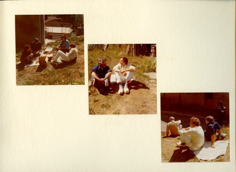 Scrapbook page with 3 photos of artists relaxing outside on the grass