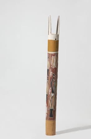 Yellow ochre pole with animal imagery in red ochre, white and black pigments. White forms extend from the top of the pole.