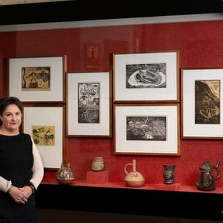 Photo of a woman smiling a gallery