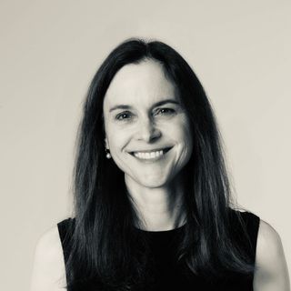 Black and white portrait of a woman with long black hair.