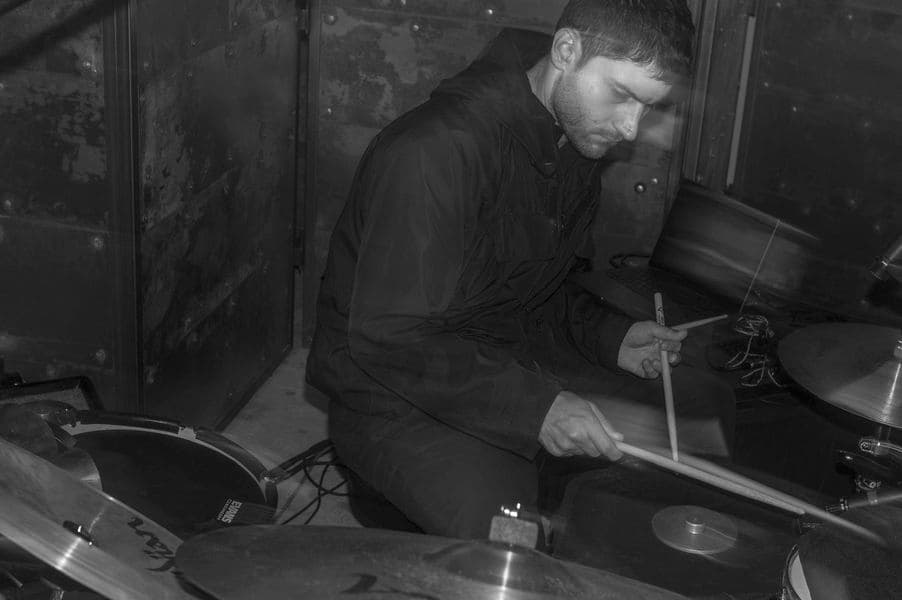 A black and white photo of a percussionist.