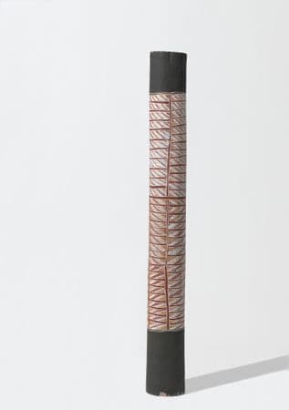 Black pole with central ochre, white and yellow crosshatched designs