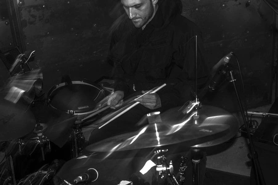 A black and white photo of a percussionist.