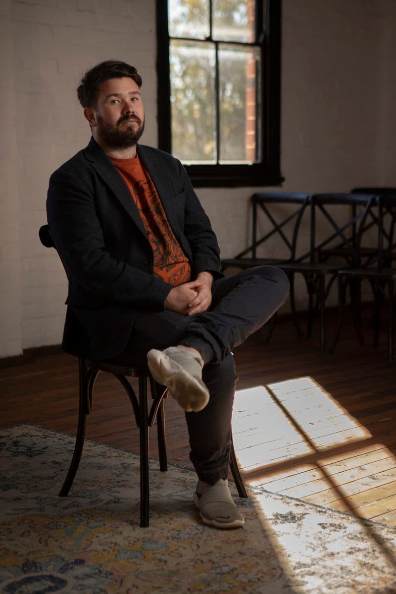Portrait of a male sitting in a chair