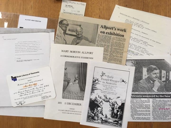 Photograph of ephemera spread on desk