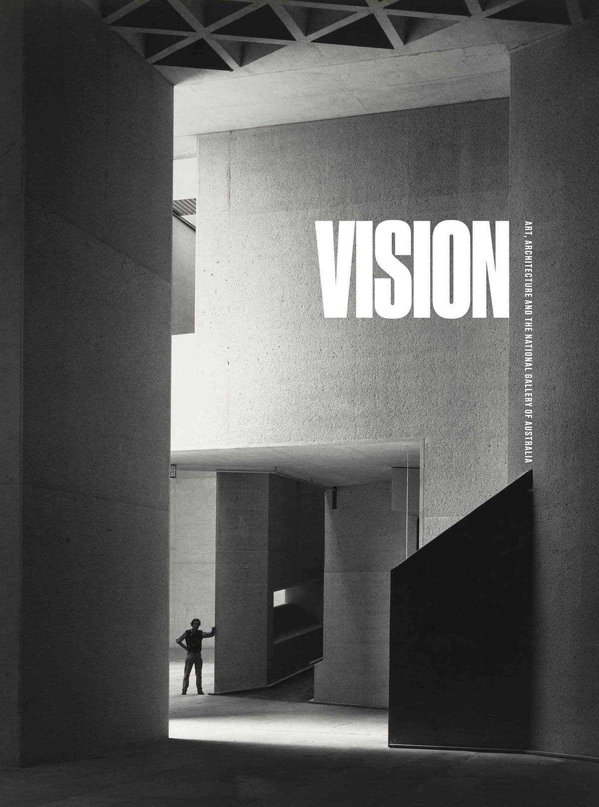 book cover featuring black and white photograph of the exterior of the National Gallery building. A small figure in shadow is visible in the bottom left corner. The text on the cover reads VISION: Art, Architecture and the National Gallery of Australia.