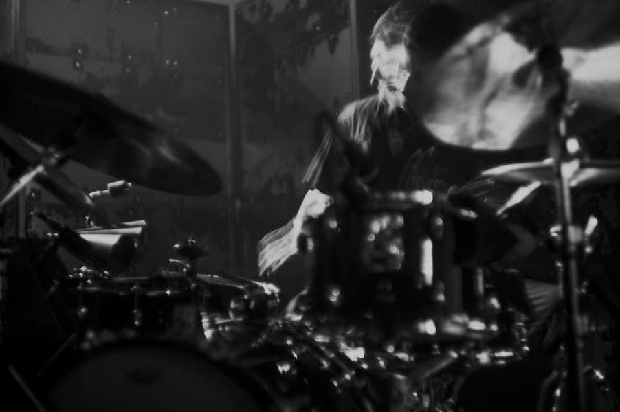 A black and white photo of a percussionist.