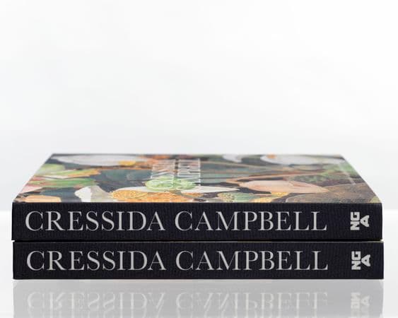 Colour photograph of books spines of Cressida Campbell Catalogue