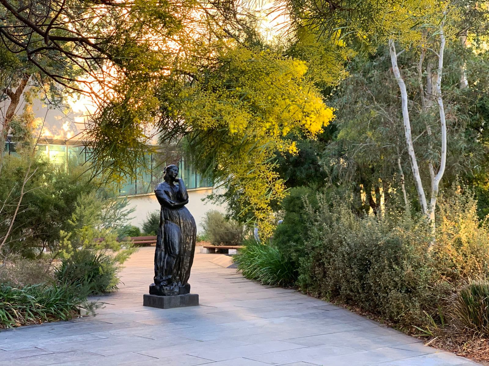 Photograph of bronze sculpture in a garden