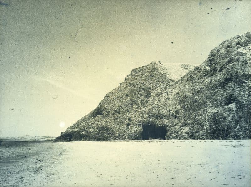 Daguerreotype photograph of coastal landscape with rock formation