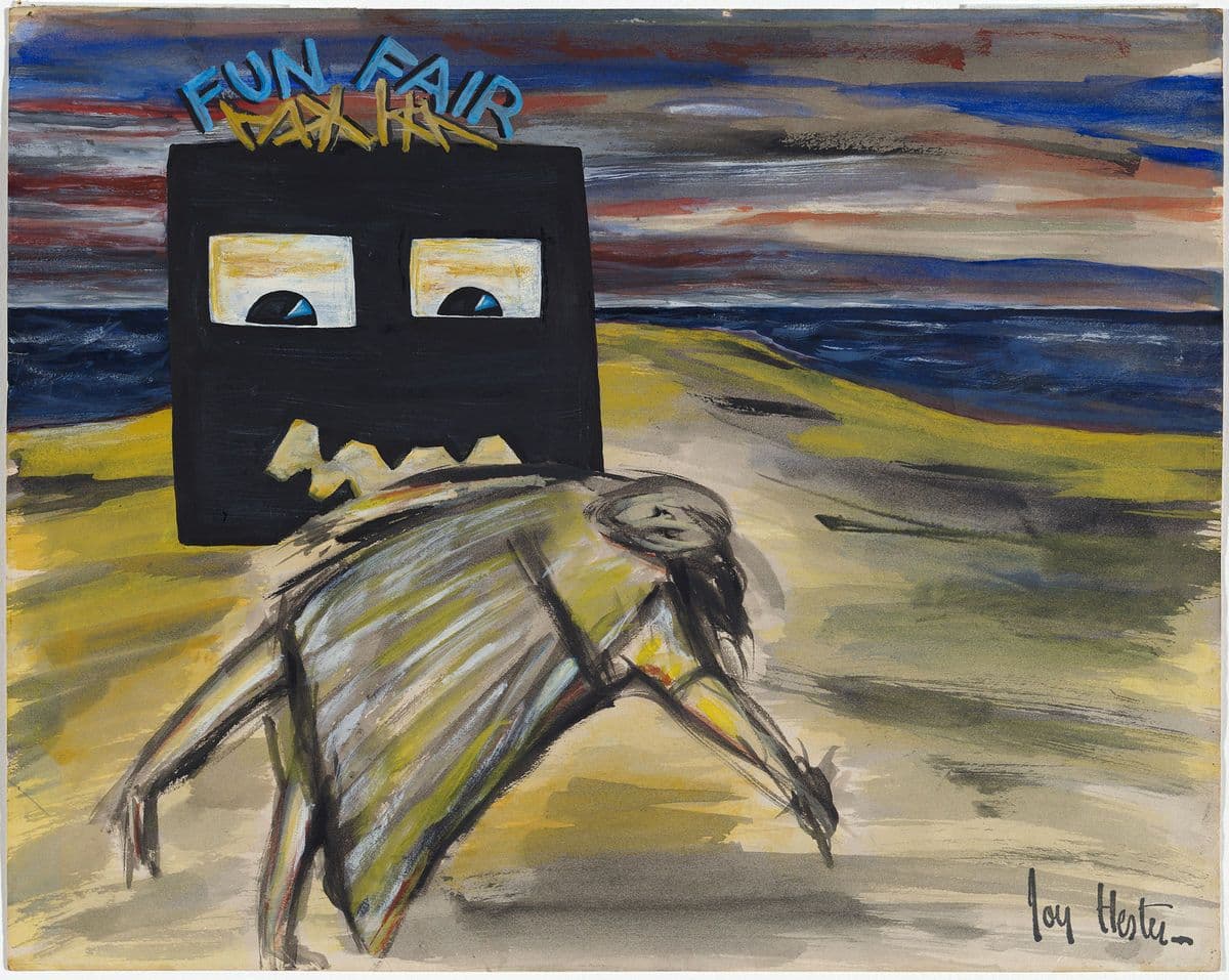A figure lies on the ground below a fun fair sign