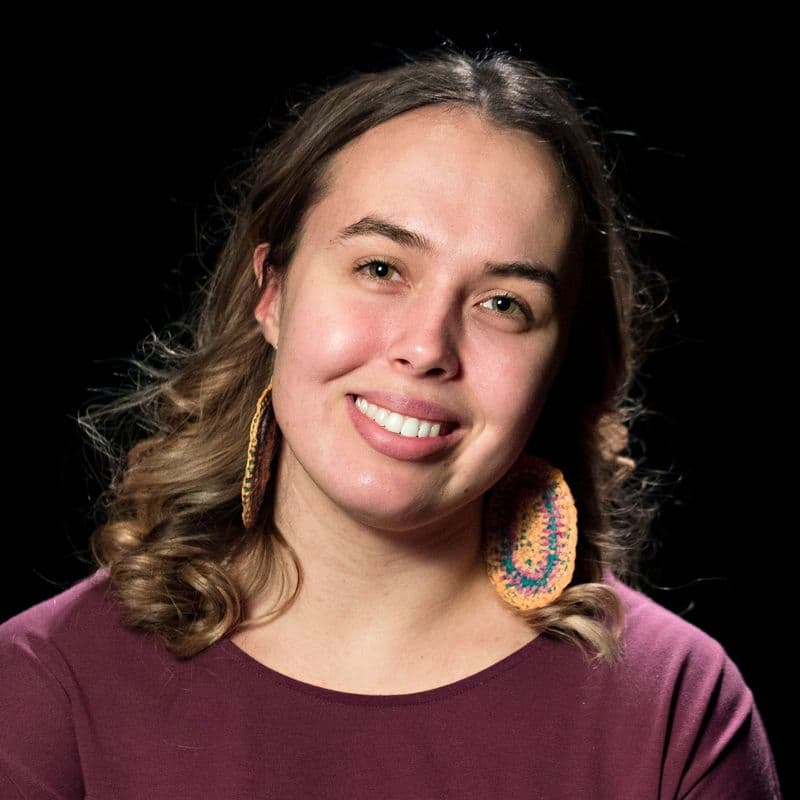 Portrait photograph of a woman smiling