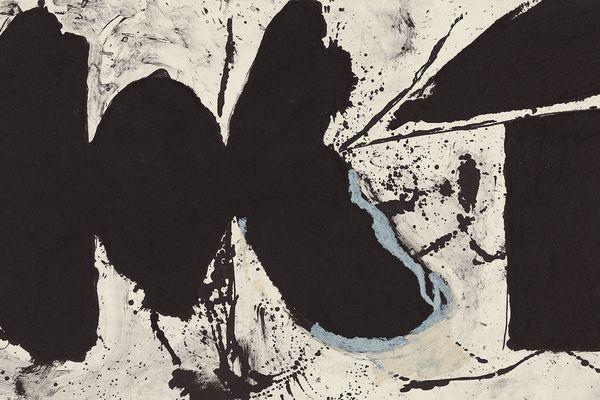 Black and white abstract print with small areas of pale blue