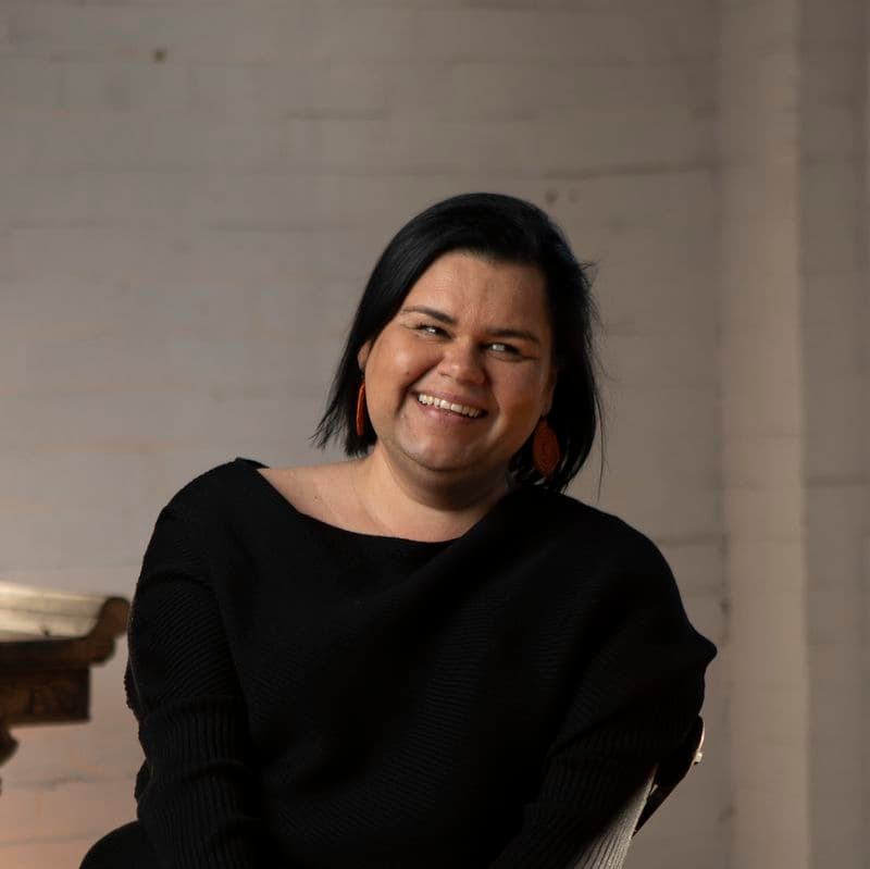 Portrait of a female sitting in a chair