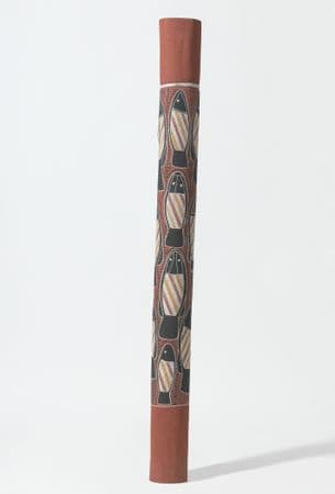 Ochre pole with painting of a black fish pattern with yellow, white and ochre stripes