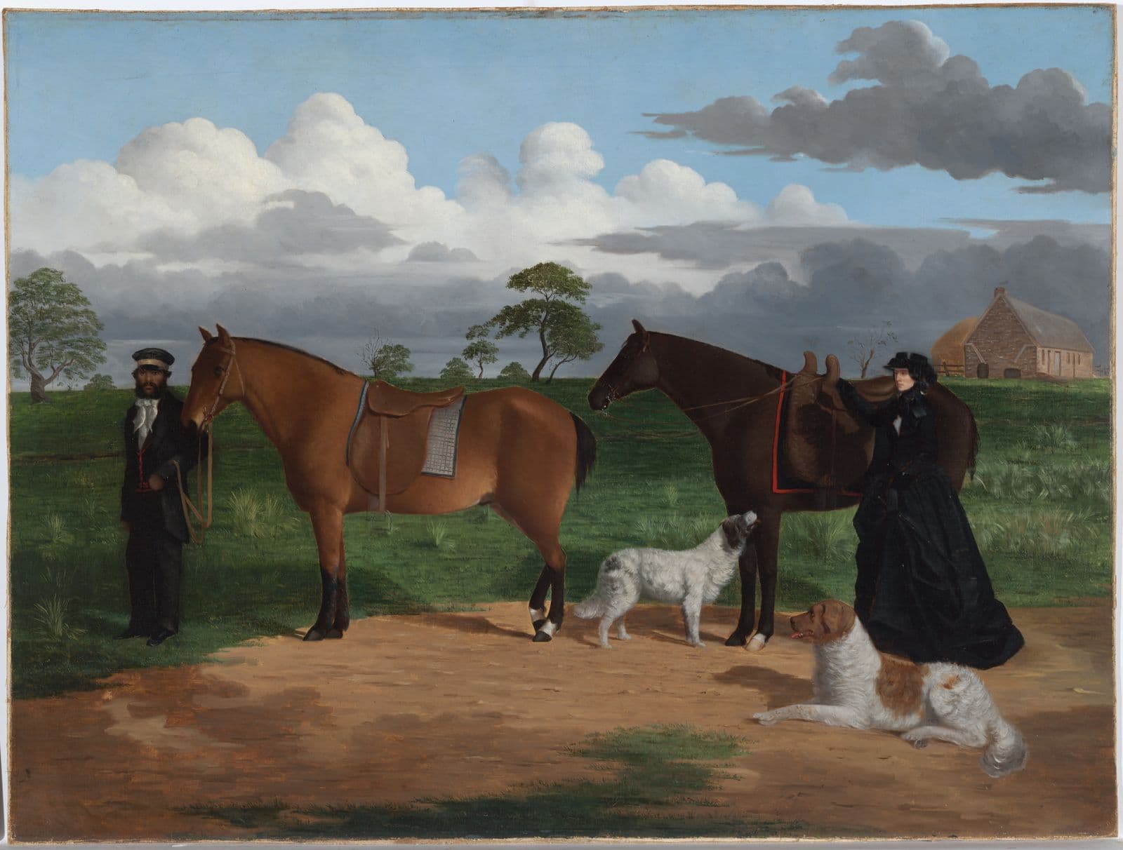 Two horses, one dark brown and one light brown. The horses' reigns are held by a woman and a man. Two dogs sit near the dark brown horse