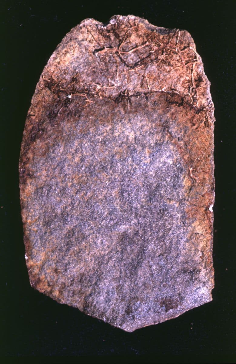 Photograph showing chipped-off section of a prehistoric stone object