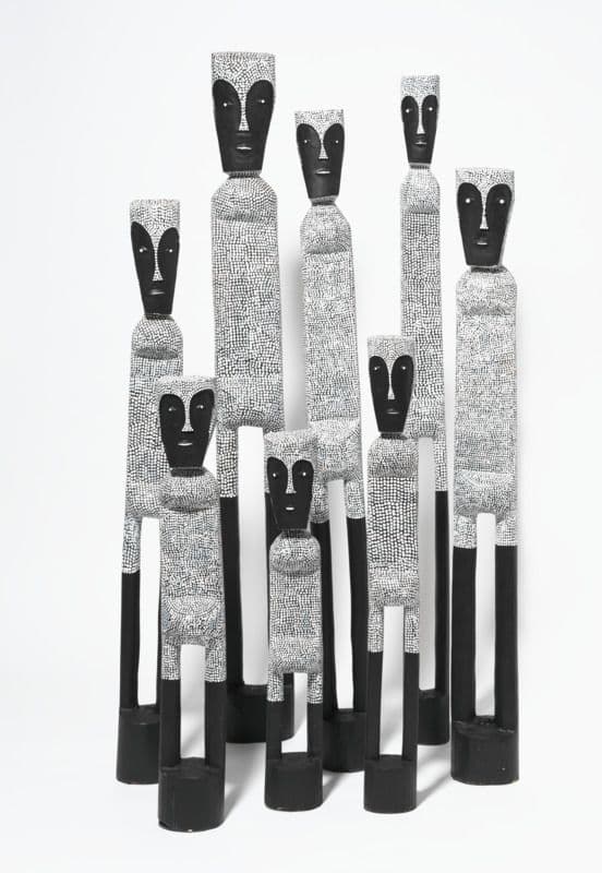 A group of eight black and white mimi spirits or Mokuy.