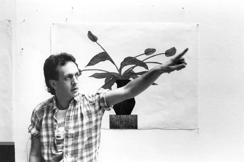 Ed Baynard pictured in front of his 15 colour woodblock print ‘The Blue Tulips’