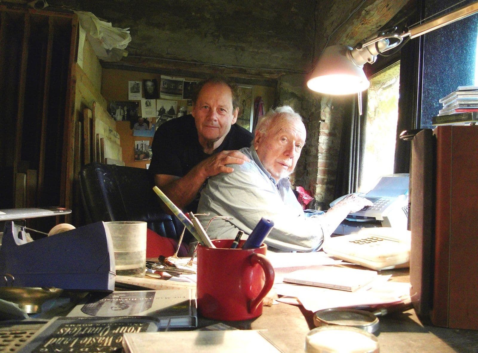 Photograph of Bruce Beresford and Jeffery Smart in the artist's home