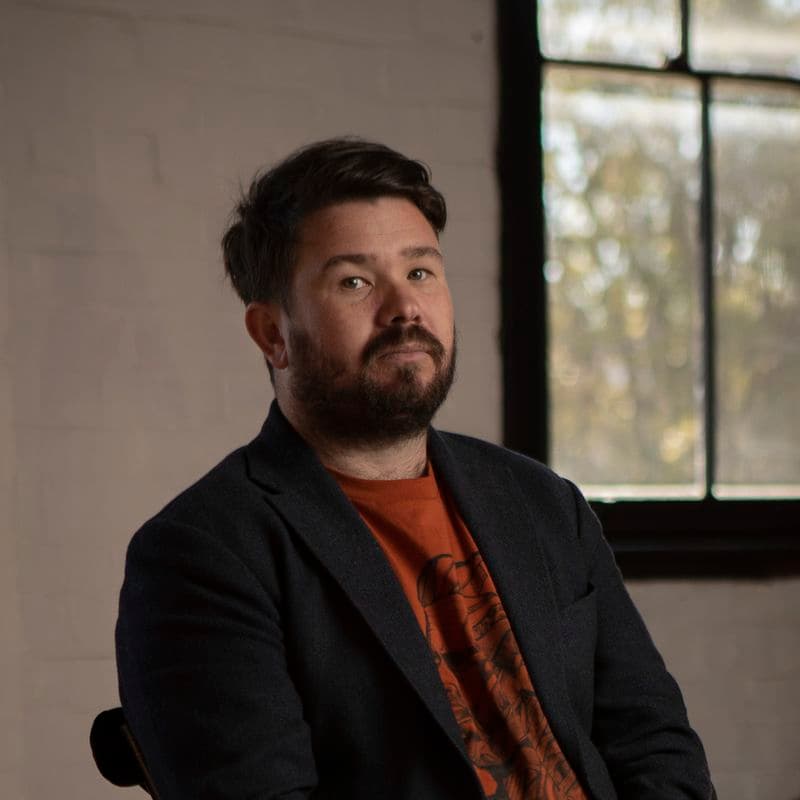 Portrait of a male sitting in a chair