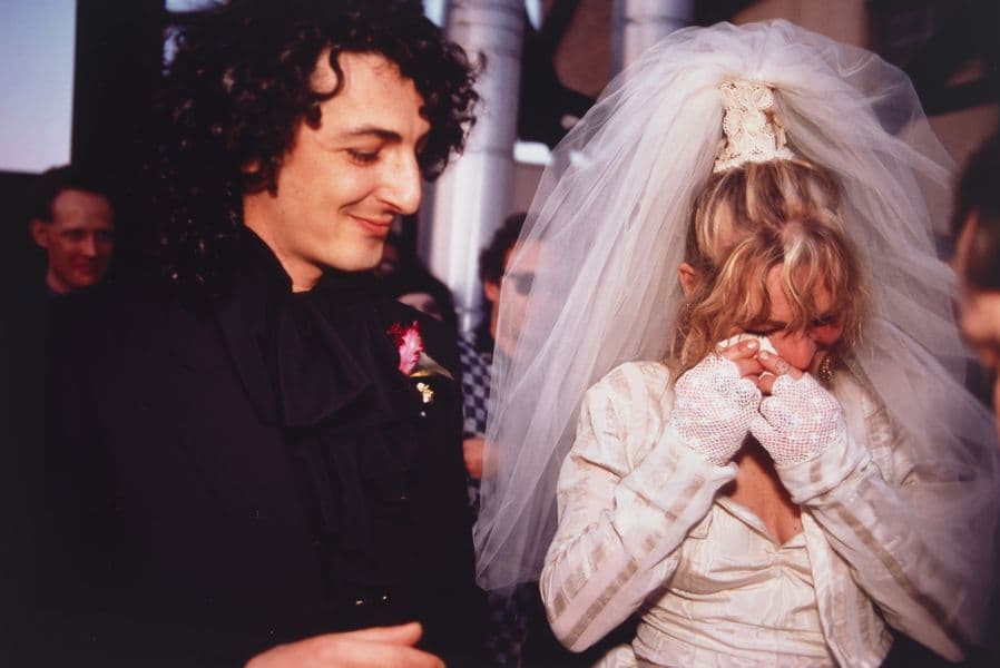 Friends of artist Nan Goldin pictured at their wedding.