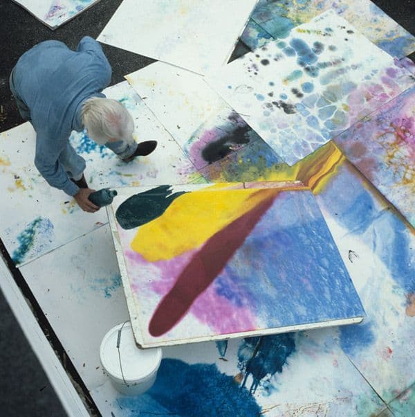 Paul Jenkins pouring dye onto canvas