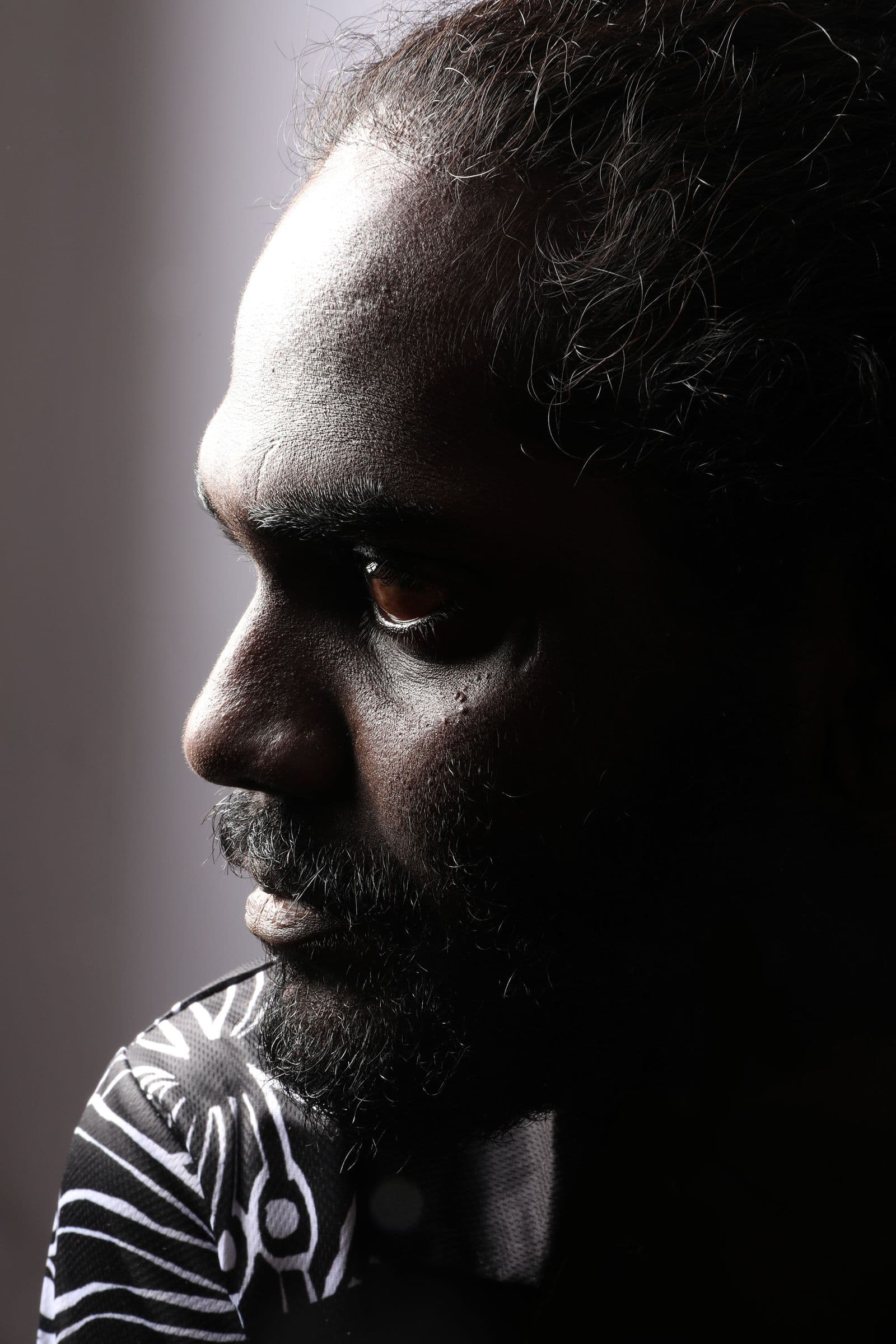 Portrait photograph of artist Gutiŋarra Yunupiŋu