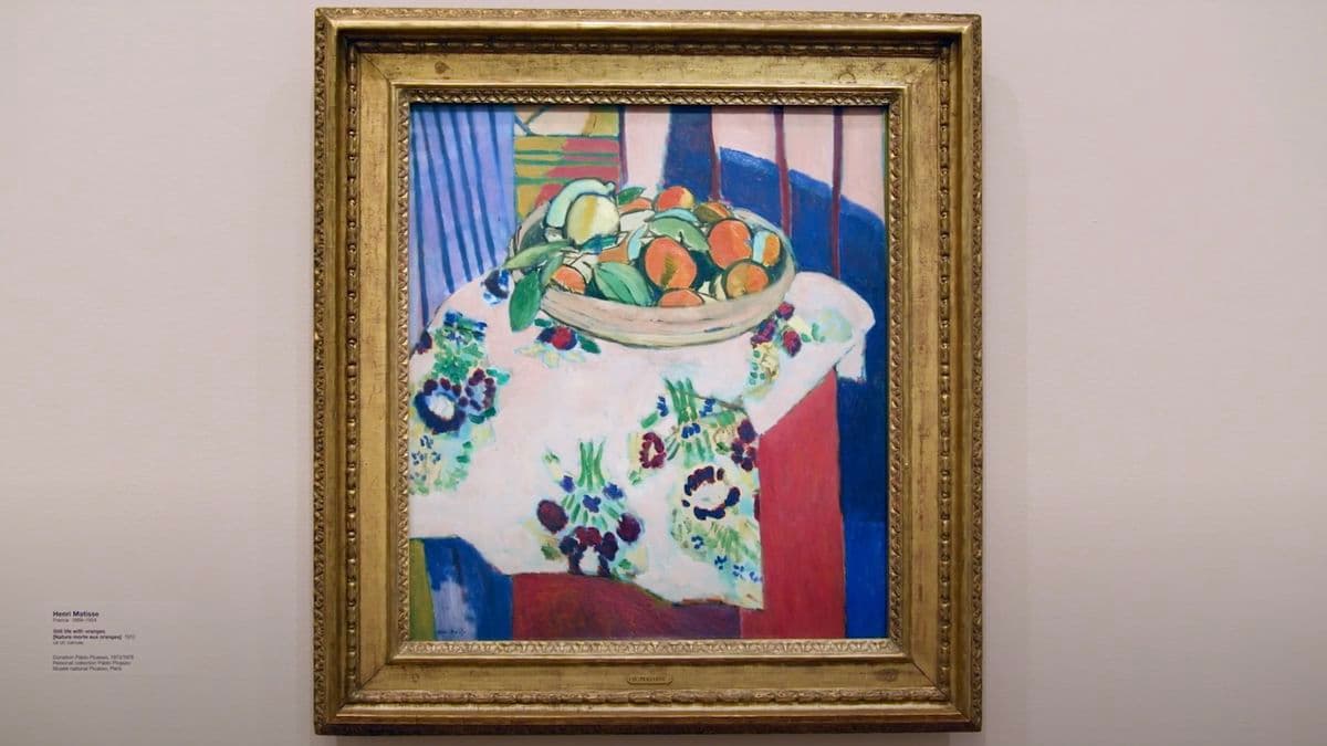 Video still of framed painting in exhibition.