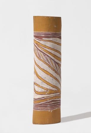 Short and wide pole with yellow, white and ochre fluid pattern