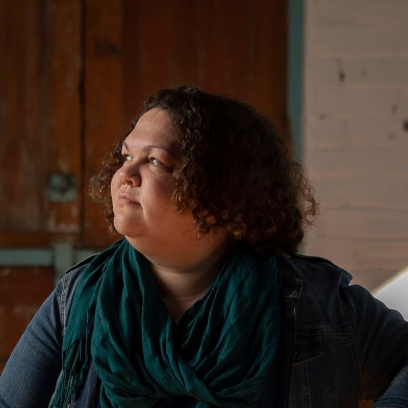 Portrait of a female sitting in a chair