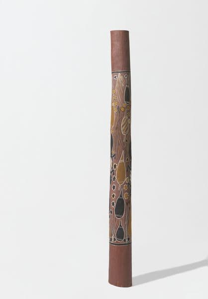 Traditional First Nations pole with ochre, yellow, white and black Gecko and blood yam imagery