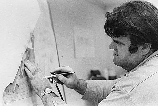 Black and white photograph of William Crutchfield painting in his studio