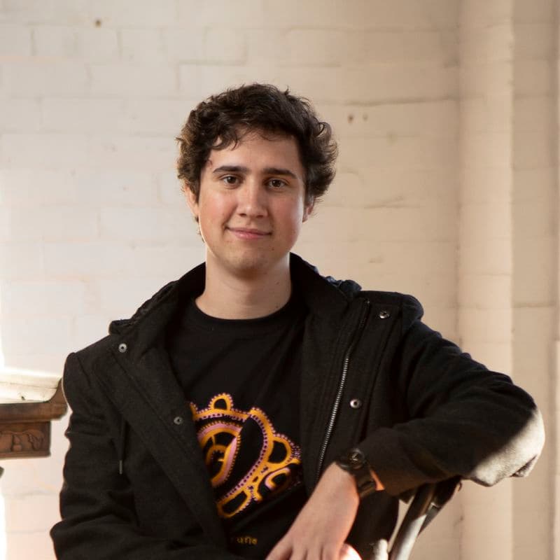 Portrait of a male sitting in a chair