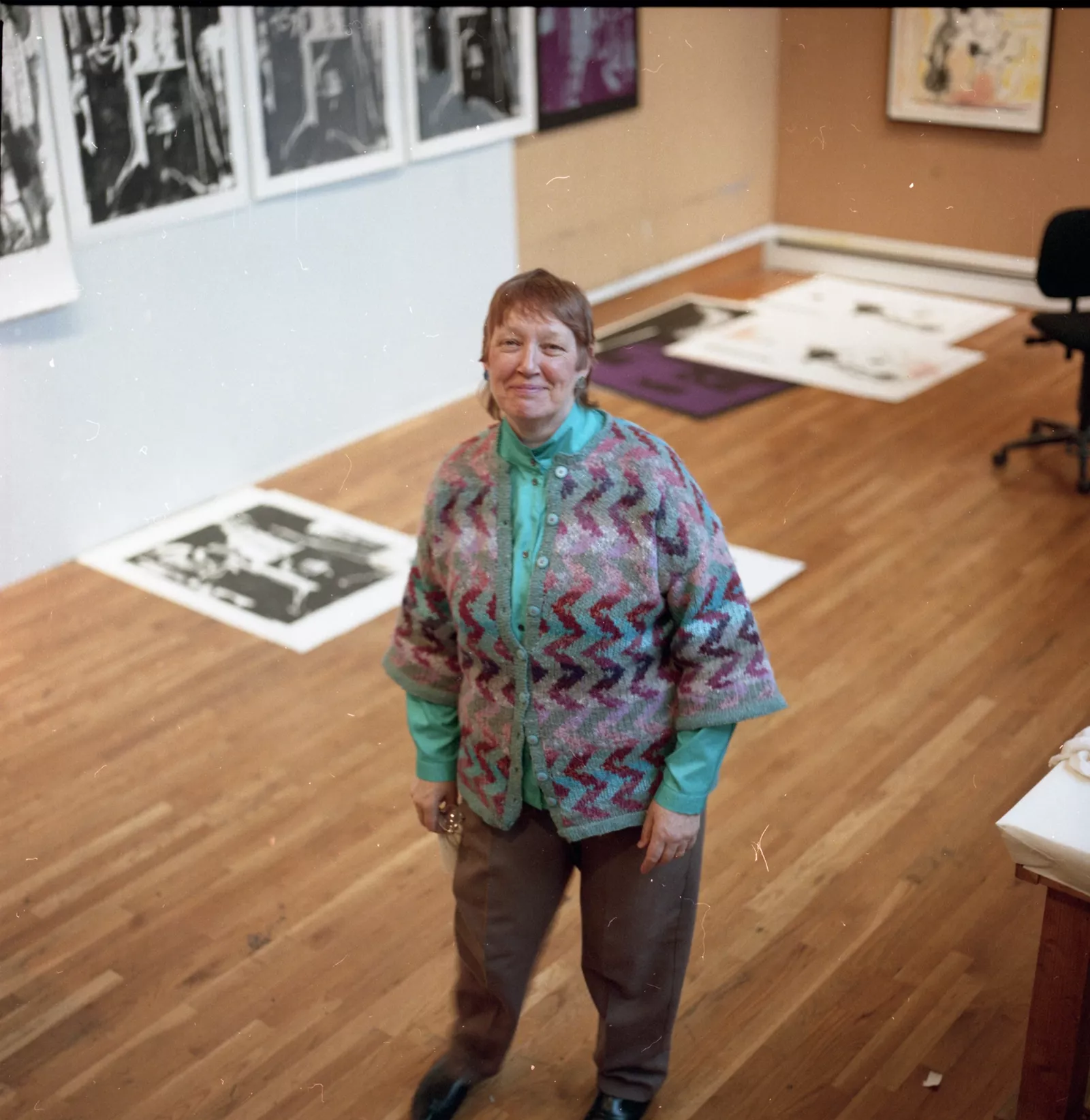 Colour photo of Pat Gilmour in an art studio