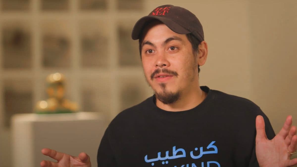 Video still of artist speaking.