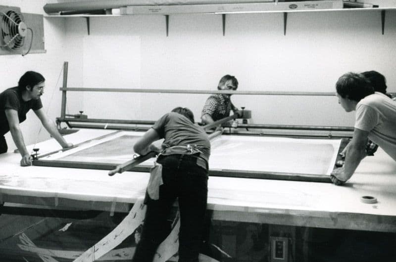 Black and white photo of four printers working on Frank Stella's 'Bermuda Petrel'