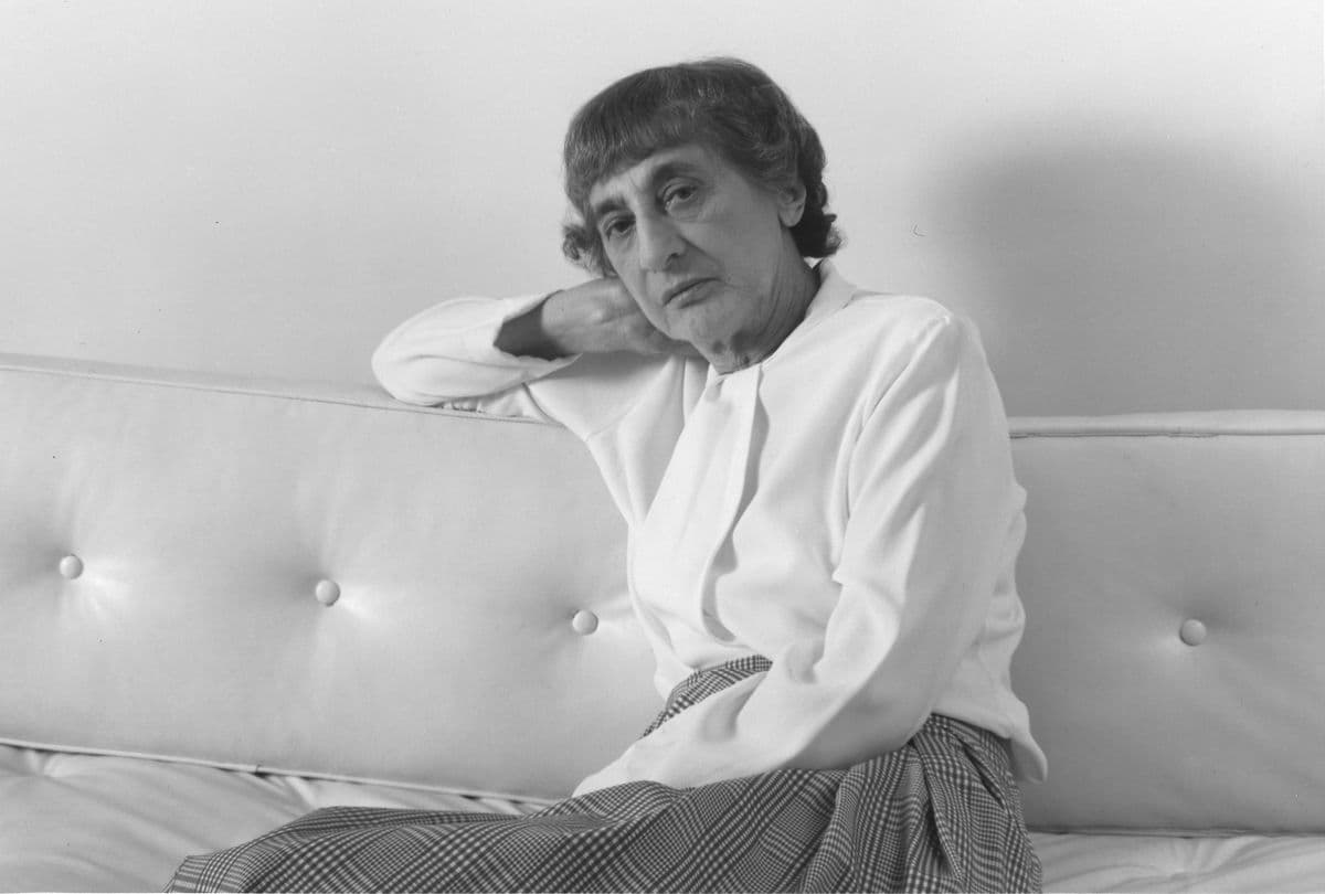 Black and white photograph of Anti Albers posing white on a couch