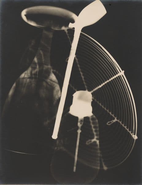 A sepia toned photogram that depicts the shadow of a pipe for smoking tobacco with.