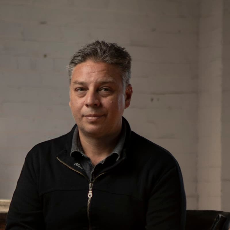 Portrait of a male sitting in a chair
